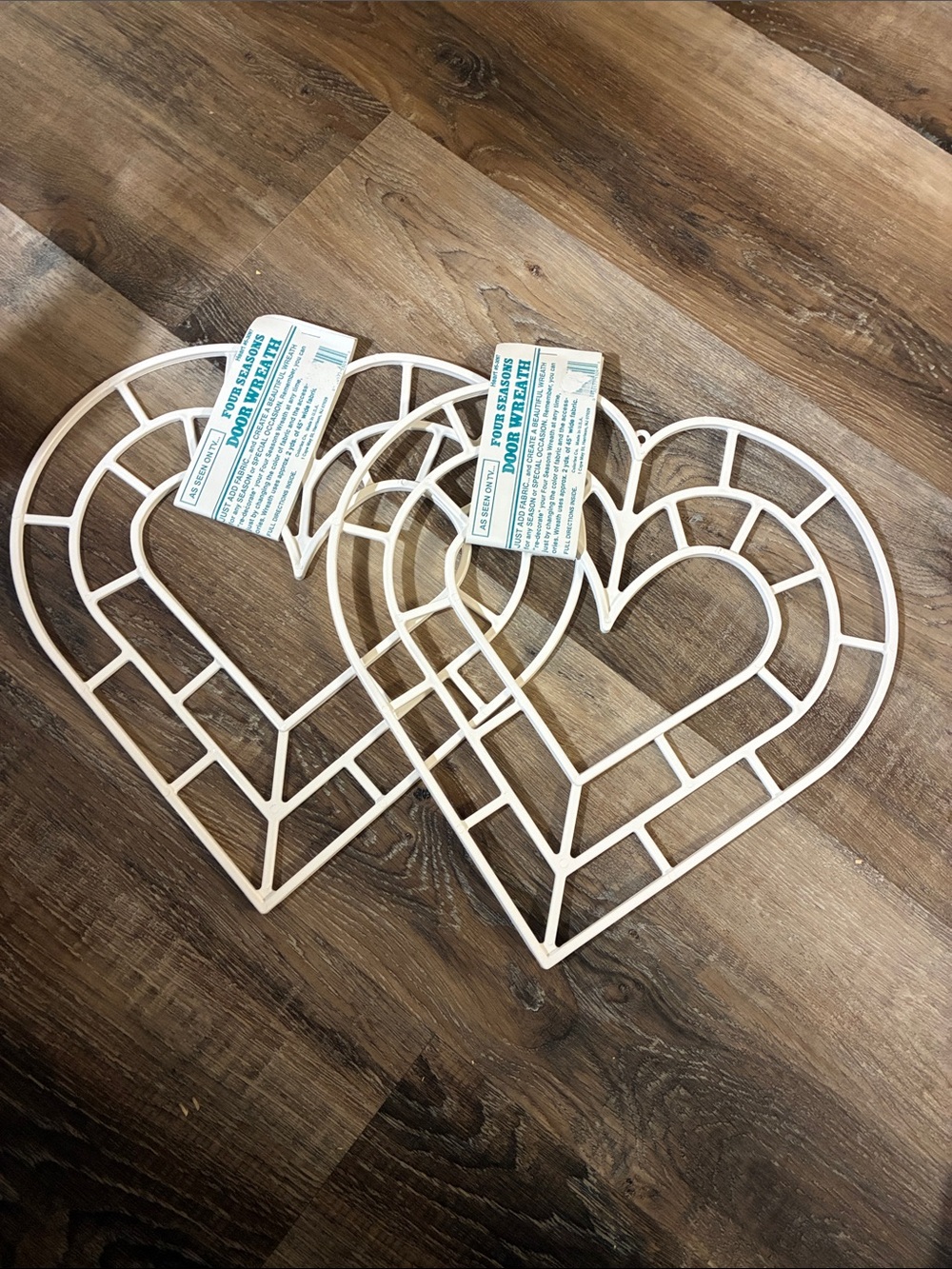 2 heart shaped plastic door wreath